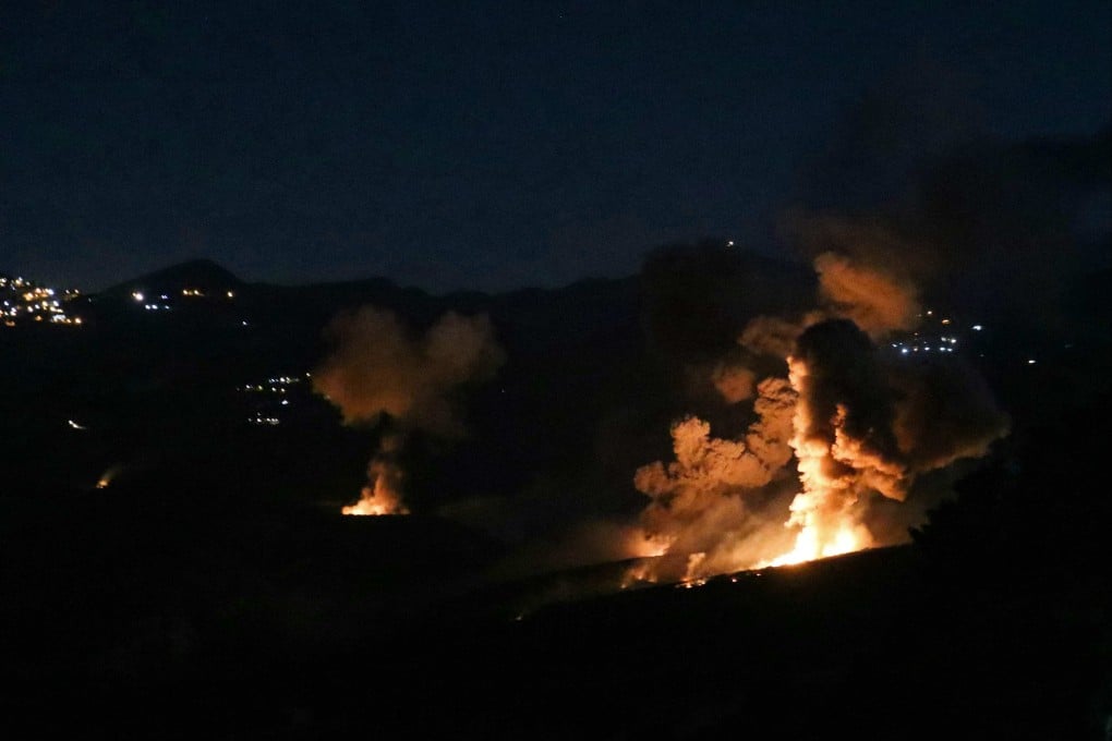 Smoke and fire rise from the site of an Israeli strike on the southern Lebanese border village of Mahmoudiyeh on Thursday. Photo: AFP