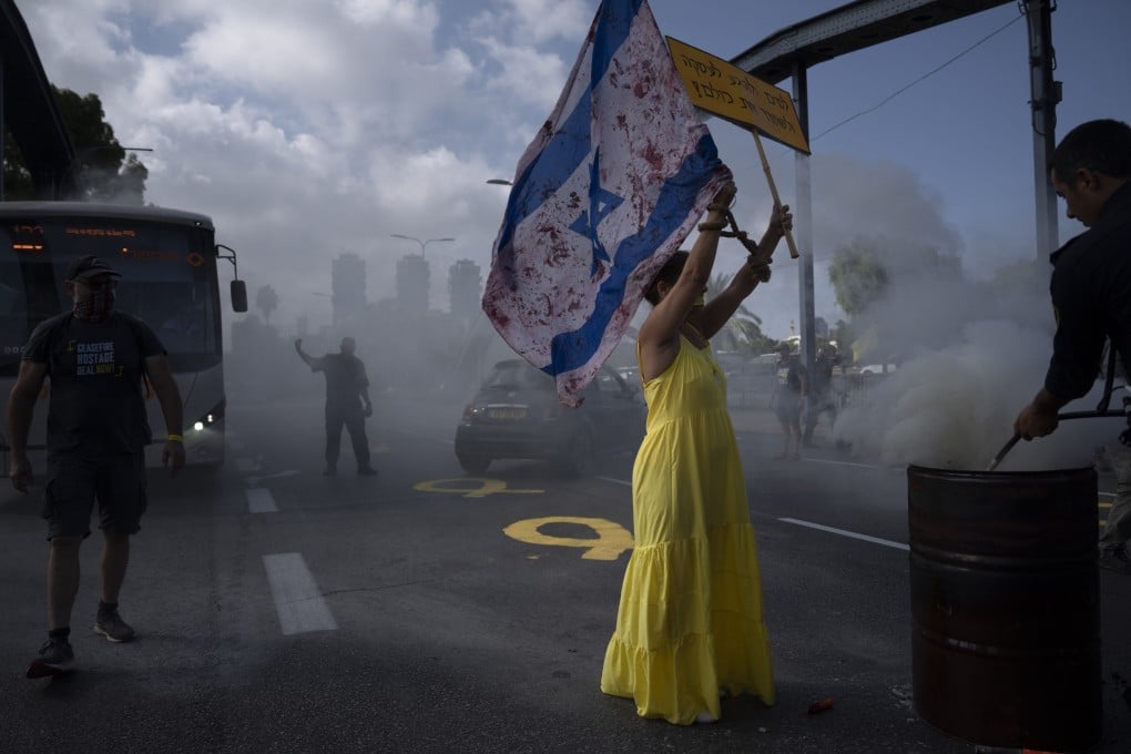 Relatives and friends of hostages held in the Gaza Strip by Hamas block a road in Tel Aviv during a protest on September 13 demanding their release. Photo: AP