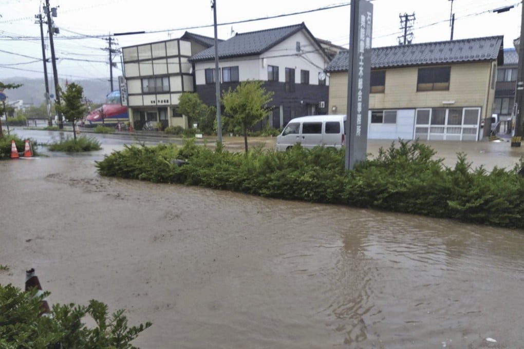 A road is flooded after heavy rain in Wajima, Ishikawa prefecture in Japan. Photo: AP