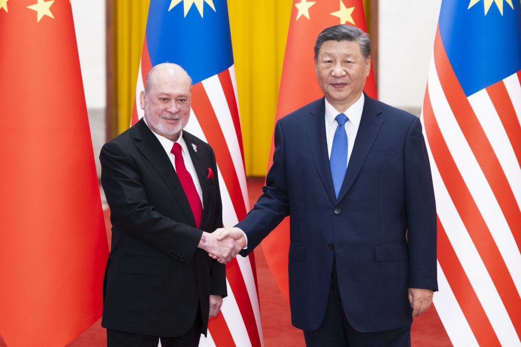 Chinese President Xi Jinping with the Malaysian king, Sultan Ibrahim Iskandar, at the Great Hall of the People in Beijing on Friday. Photo: Xinhua