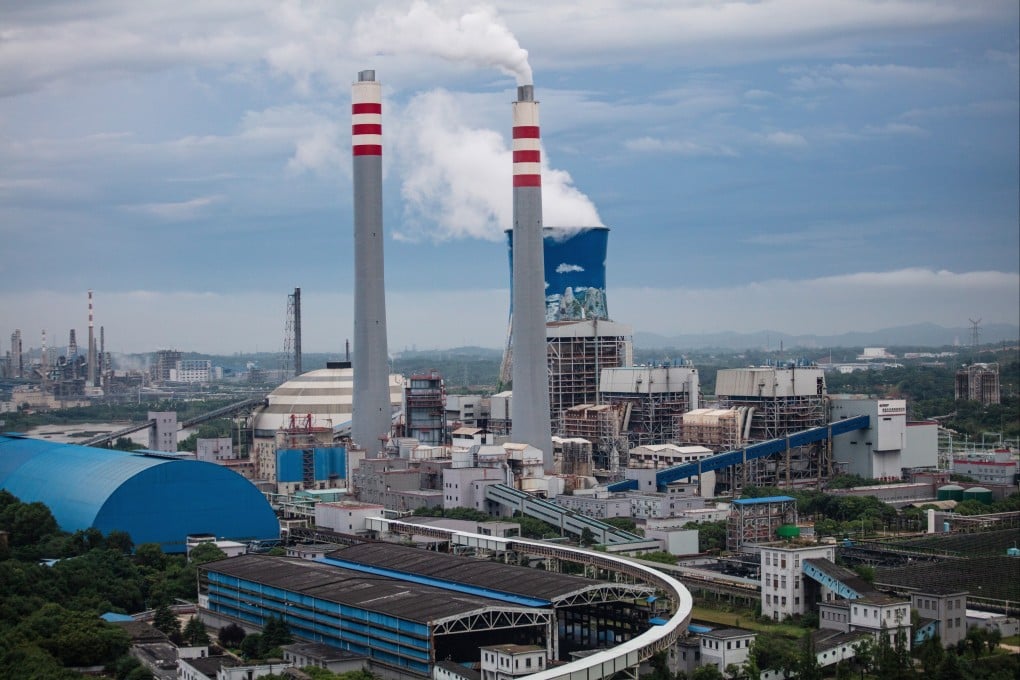 Huge chimneys spew smoke at a coal power plant in China. Photo: Shutterstock