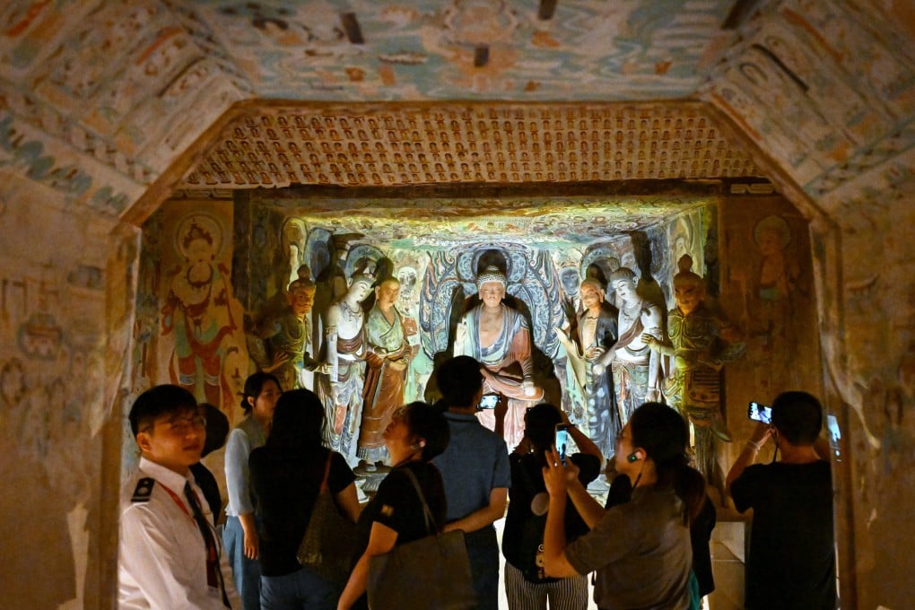 A replica of a cave from the Mogao grottoes on display at the “Why Dunhuang” art exhibition in Shanghai. The exhibition will run until December 20. Photo: Xinhua