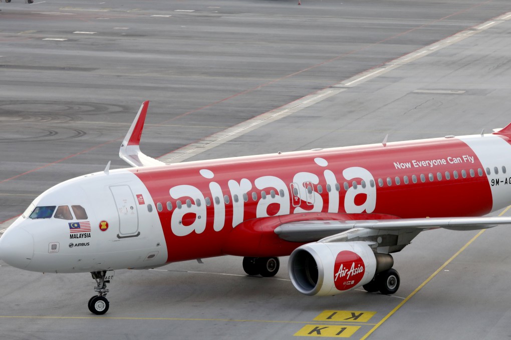 A Chinese national was jailed for seven months after he stole a credit card belonging to another passenger on an AirAsia flight to Singapore. Photo: Reuters