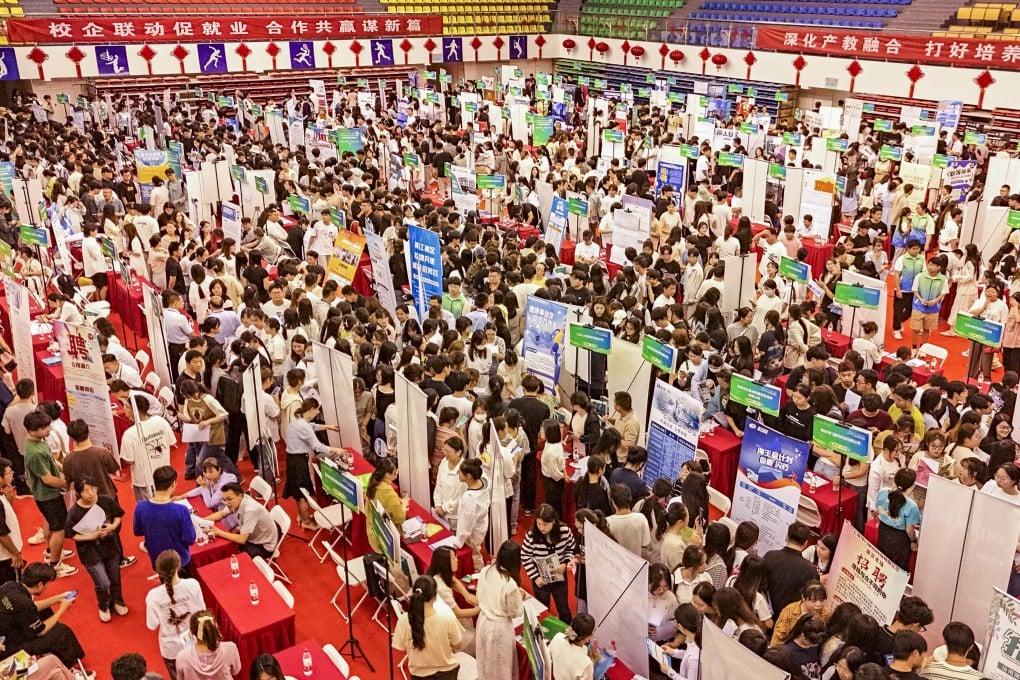 University students attend a campus job fair in eastern China’s Jiangsu province on June 16. Photo: CFOTO/Future Publishing via Getty Images