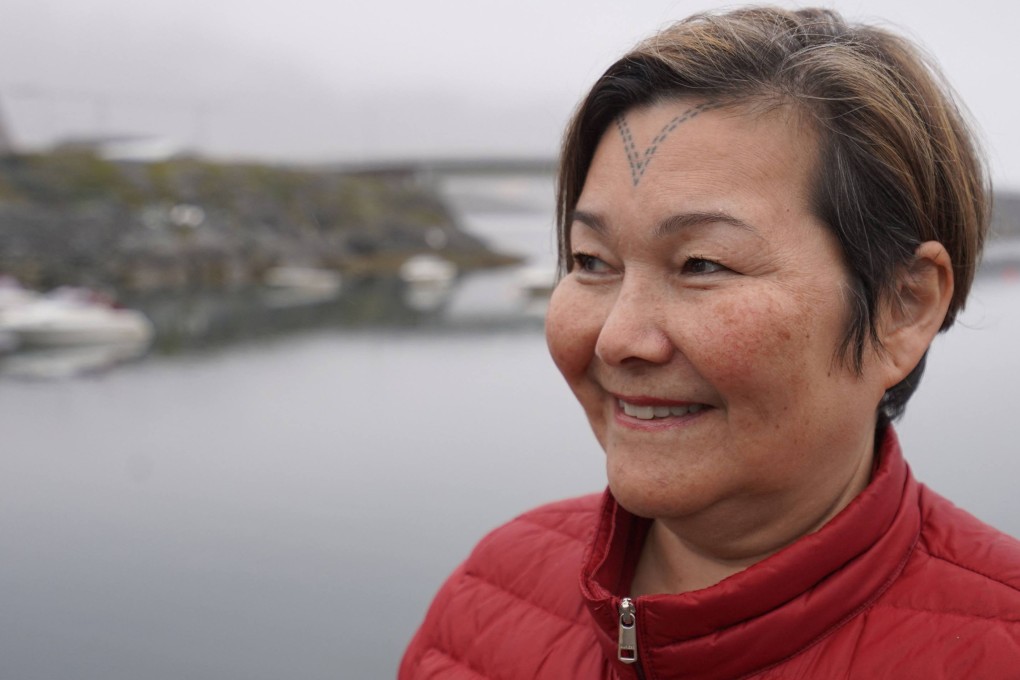 Andu Schiodt Pikilak, 61-year-old psychologist, shows her facial tattoo in Nuuk, Greenland. Traditional Inuit facial tattoos, primarily worn by women, are seeing a comeback in the country. Photo: AFP