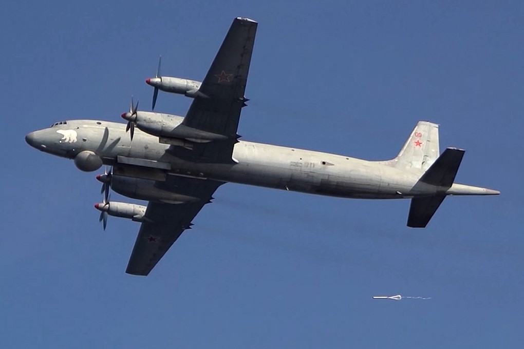 An Il-38 maritime patrol aircraft of the Russian navy is seen flying over the Barents Sea during navy drills on September 9. Photo: Russian Defense Ministry Press Service/AP