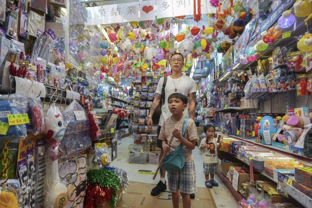 Shoppers seize the last chance to visit Yat Sing Toys at Tai Yuen Street, nicknamed “Toy Street”, in Wan Chai on September 6 as the shop prepares to close after some 30 years. Photo: Eugene Lee