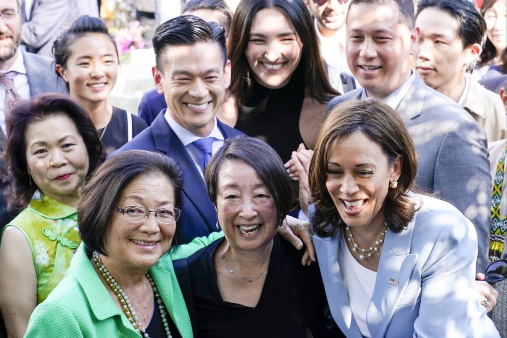 Vice-President Kamala Harris (right) takes a photo with Senator Mazie Hirono (left) and others, in the Rose Garden of the White House on May 17, 2022, during a reception to celebrate Asian American and Pacific Islander Heritage Month. Photo: AP