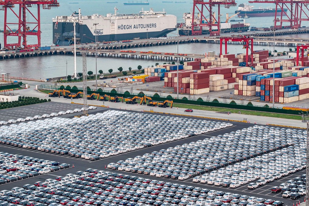 Cars at a port in eastern China before they are loaded for export. Photo: AFP