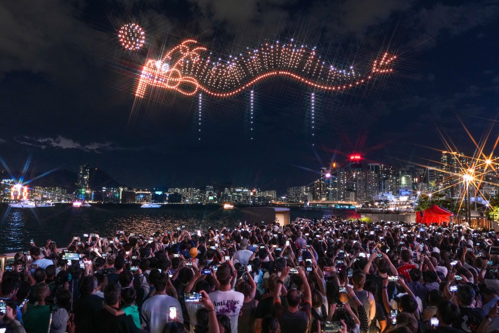A drone show during the Mid-Autumn Festival is a hit with spectators at the harbourfront in Wan Chai. Photo: Eugene Lee
