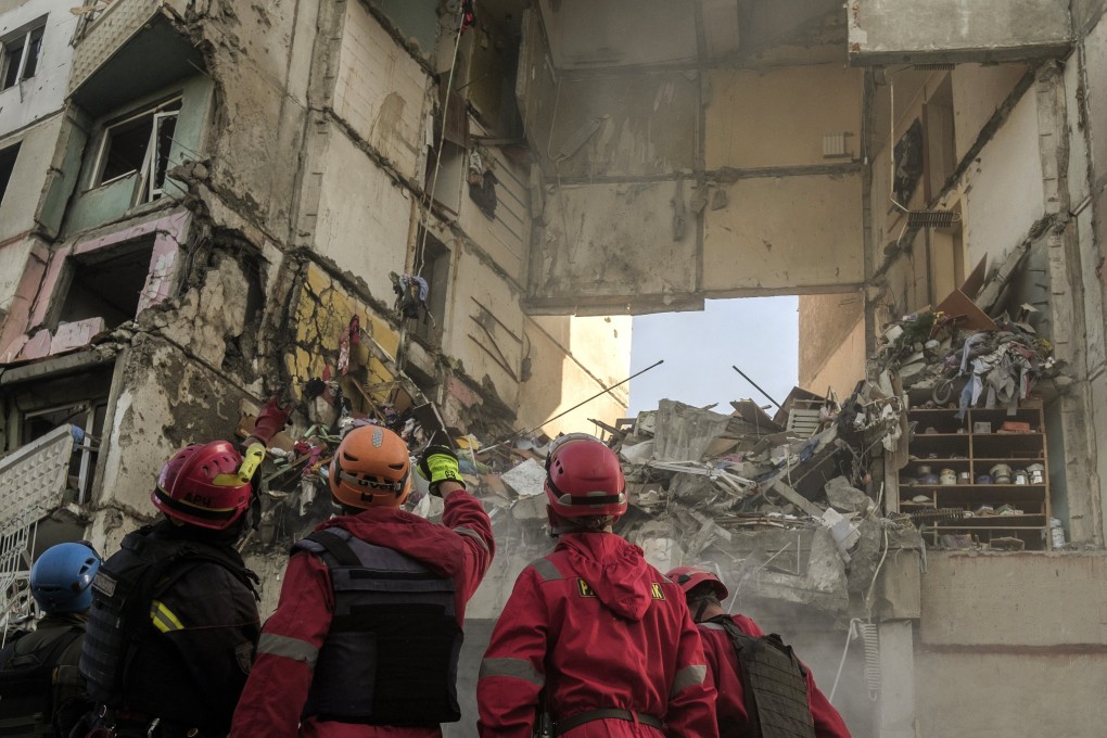 Rescuers work at the site of a high-rise residential building shelled by Russia in the Ukrainian city of Kharkiv on Tuesday. Photo: EPA-EFE
