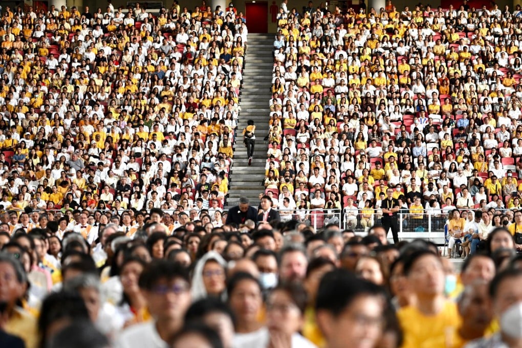 People pack the stands at Singapore’s National Stadium on September 12 for a Catholic mass led by Pope Francis. Photo: EPA-EFE