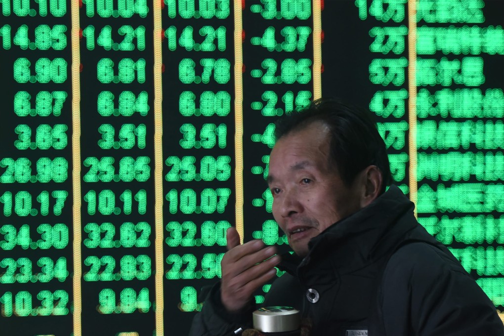 A man at a brokerage in Hangzhou. Photo: CFOTO/Future Publishing via Getty Images