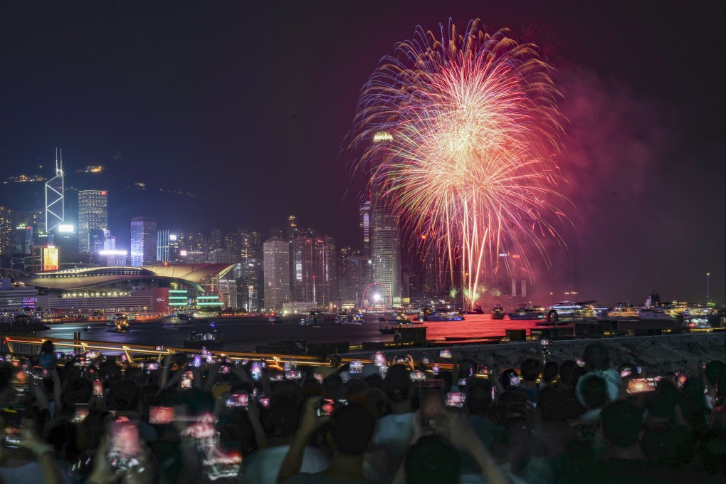 People watch a National Day fireworks display last year in Hong Kong’s North Point district. The highlight of this year’s celebrations will be a 23-minute fireworks show celebrating China’s achievements. Photo: Sam Tsang