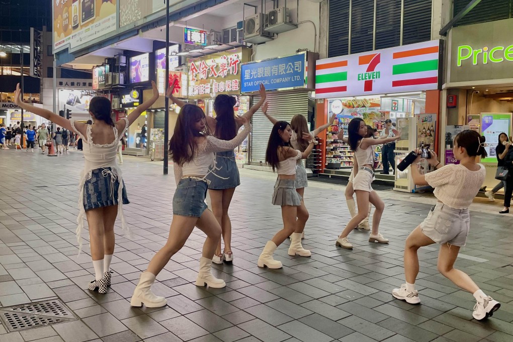 K-pop dance cover group Pixel HK during a shoot in Causeway Bay, Hong Kong. The group copies the choreography, costumes and mannerisms of their favourite Korean artists for their YouTube videos, as part of an international trend. Photo: Annie Cheung