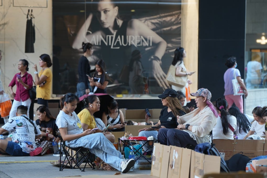 Domestic helpers enjoy their Sunday off in Central. Photo: Sam Tsang