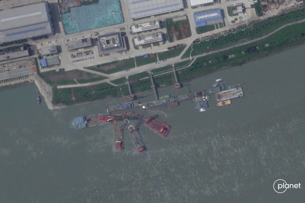 A satellite image from Planet Labs from June appear to show cranes at the Wuchang shipyard in Wuhan Shi, China on June 15. Photo: Planet Labs Inc / Handout via Reuters