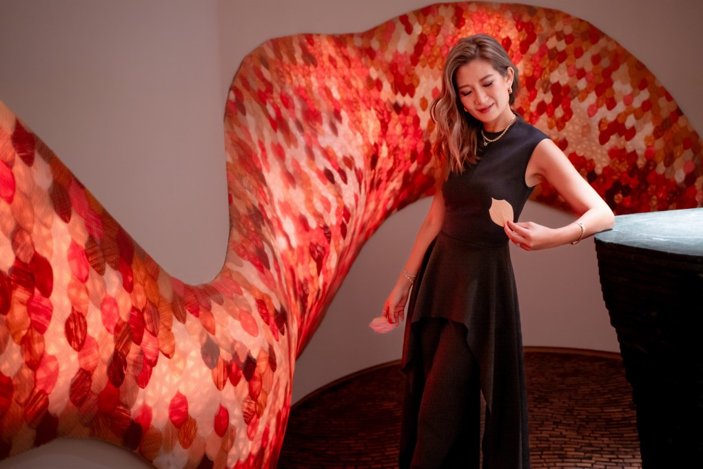 Elaine Ng and her whisky-inspired installation, Phantasmagoria. Photo: Alexander Mak