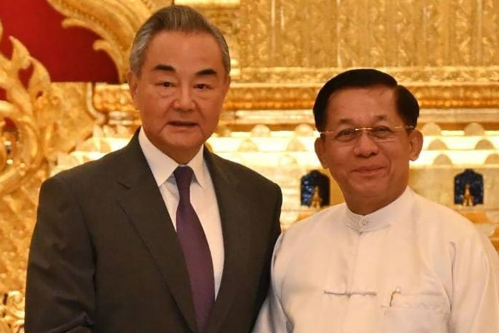 Myanmar junta chief Min Aung Hlaing (right) shakes hands with Chinese Foreign Minister Wang Yi during a meeting in Naypyitaw last month. Photo: EPA-EFE/Myanmar military information team