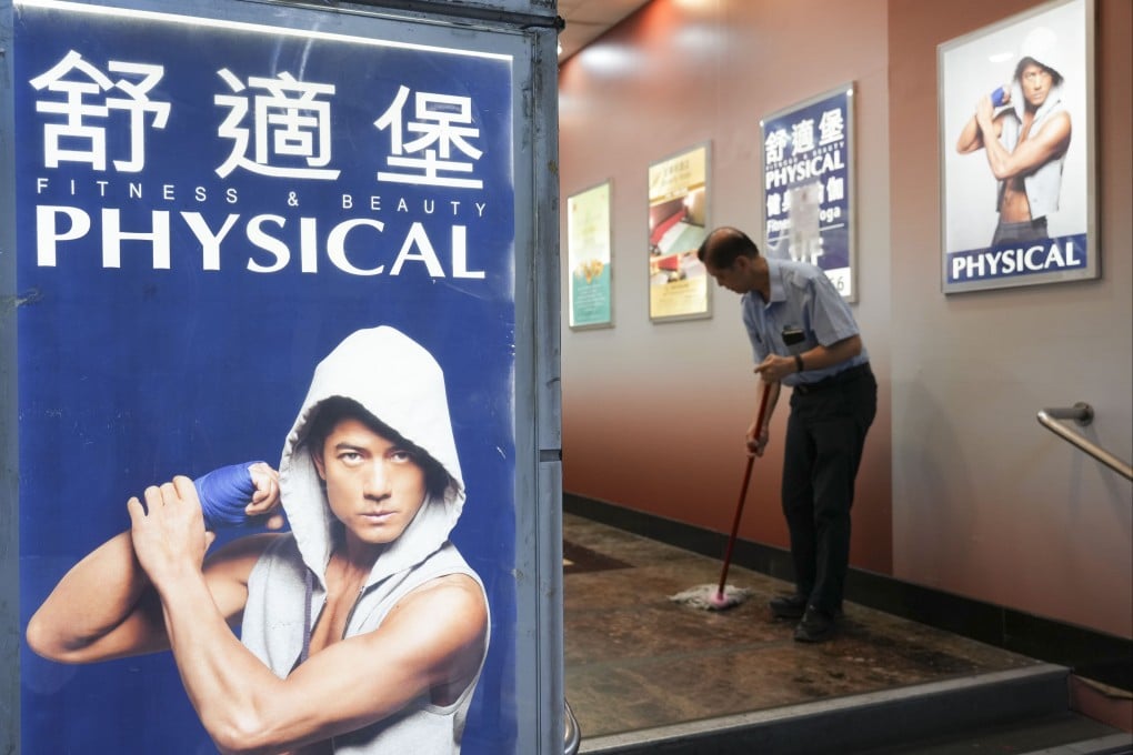 Ads for Hong Kong gym chain Physical, which announced it was shutting down after 38 years of business, at a building in Wan Chai on September 10. Photo: Sam Tsang