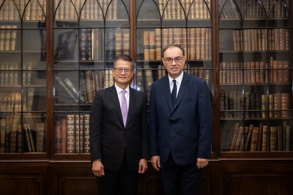 Finance chief Paul Chan (left) meets Bank of England governor Andrew Bailey to discuss the global economy and financial development. Photo: SCMP
