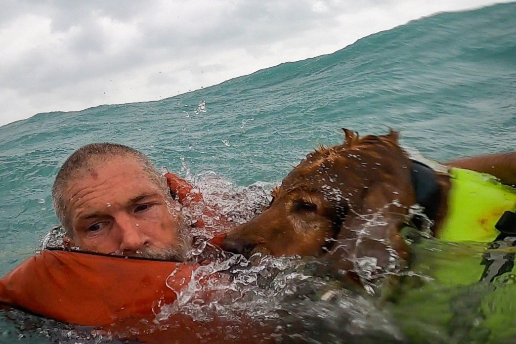 A man and his dog were rescued in the Gulf of Mexico by the US coastguard. Photo: X/USCGSoutheast