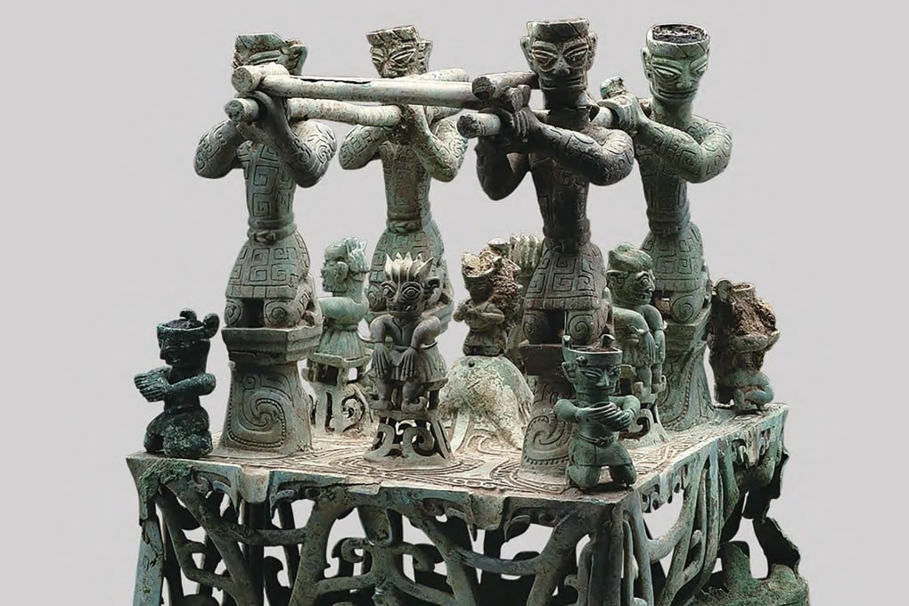 A platform adorned with 13 bronze figures is among the dazzling relics recovered from the Sanxingdui pits between 2020 and 2022. Photo: Sichuan Cultural Relics