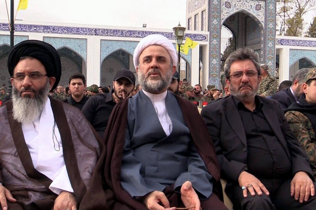 Hezbollah executive board Vice-President Nabil Qaouk, centre, between Iranian Supreme Leader representative in Syria AbolFazl Tabataba, left, and Adnan Badreddine, at the Sayyida Zeinab Shiite Shrine near Damascus in 2016. Photo: AFP