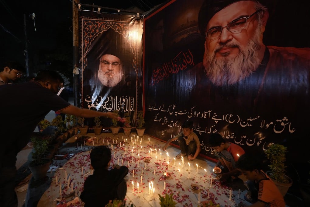 Shiite Muslims light candles in Pakistan’s Karachi during a protest against the killing of Hezbollah leader Hassan Nasrallah. Photo: AP