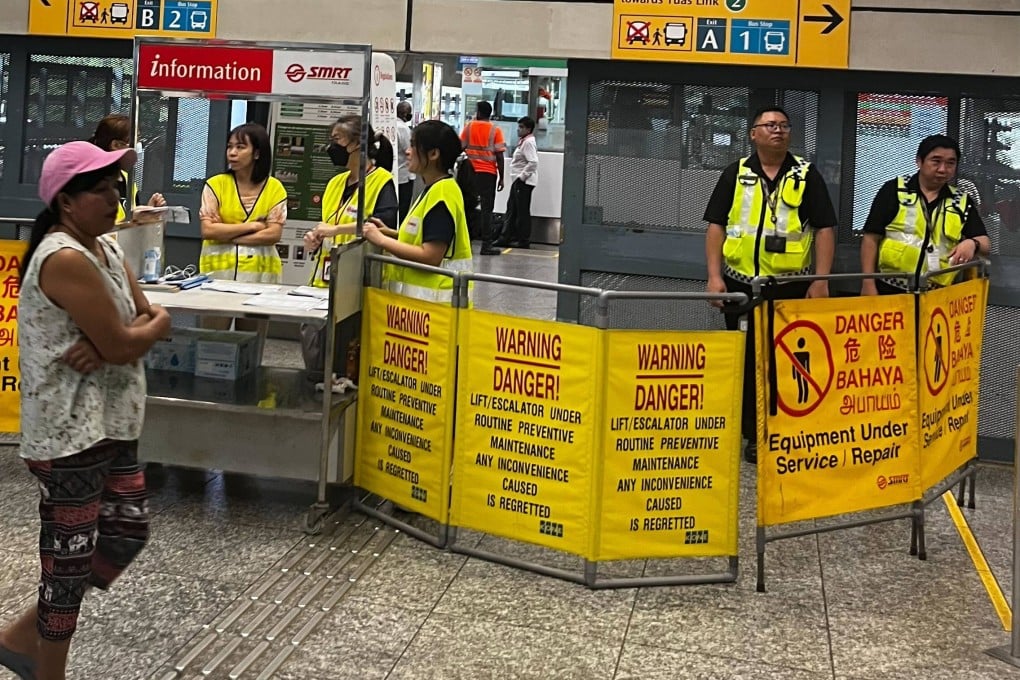 A barrier is placed at Clementi MRT station in Singapore following a major railway disruption. Photo: Jean Iau