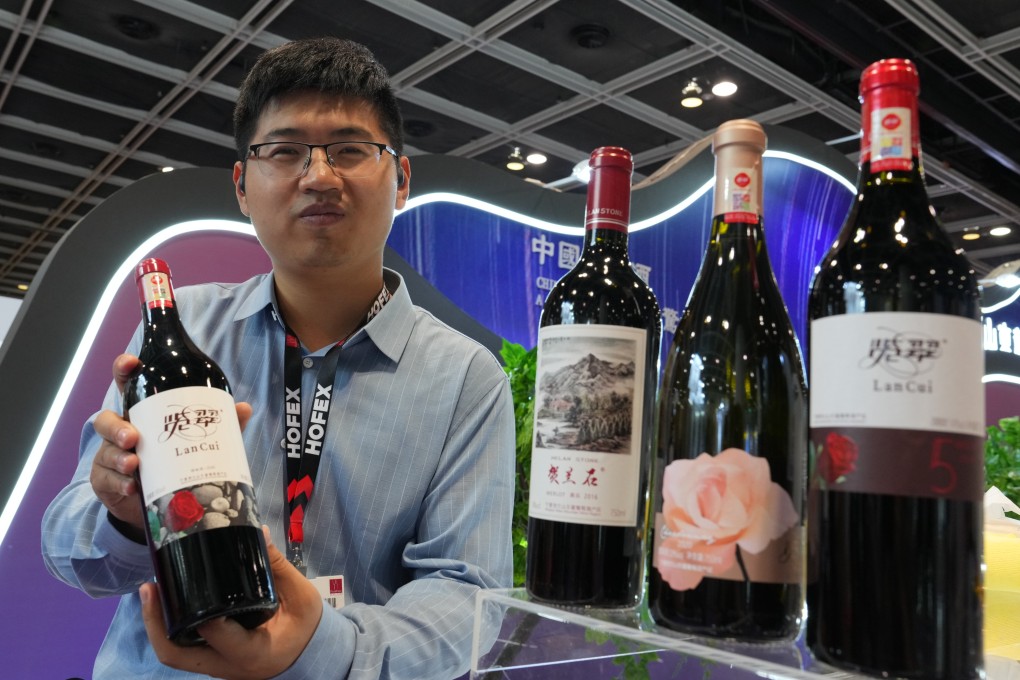 Ying Zuo from the Ningxia Lilan Winery at the Hofex food and hospitality trade show in Hong Kong. Ningxia wine producers are hoping to sell their award-winning products in the global market, with consumption in China having fallen. Photo: Elson Li