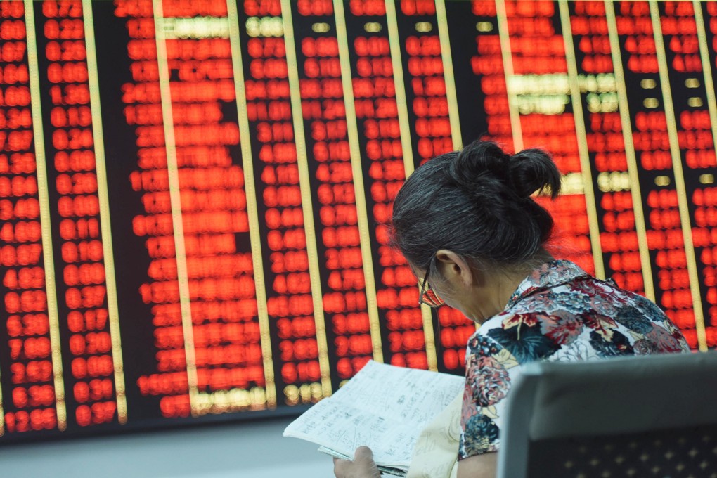 An investor studies the market in Hangzhou, capital of East China’s Zhejiang Province, Sept 24, 2024. Photo: CFOTO/Future Publishing via Getty Images