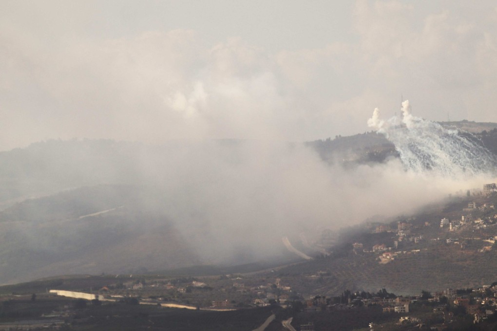 Smoke rises from Israeli artillery shelling on the southern Lebanon villages of Adeisseh and Kfar Kila along the border with Israel. Photo: AFP