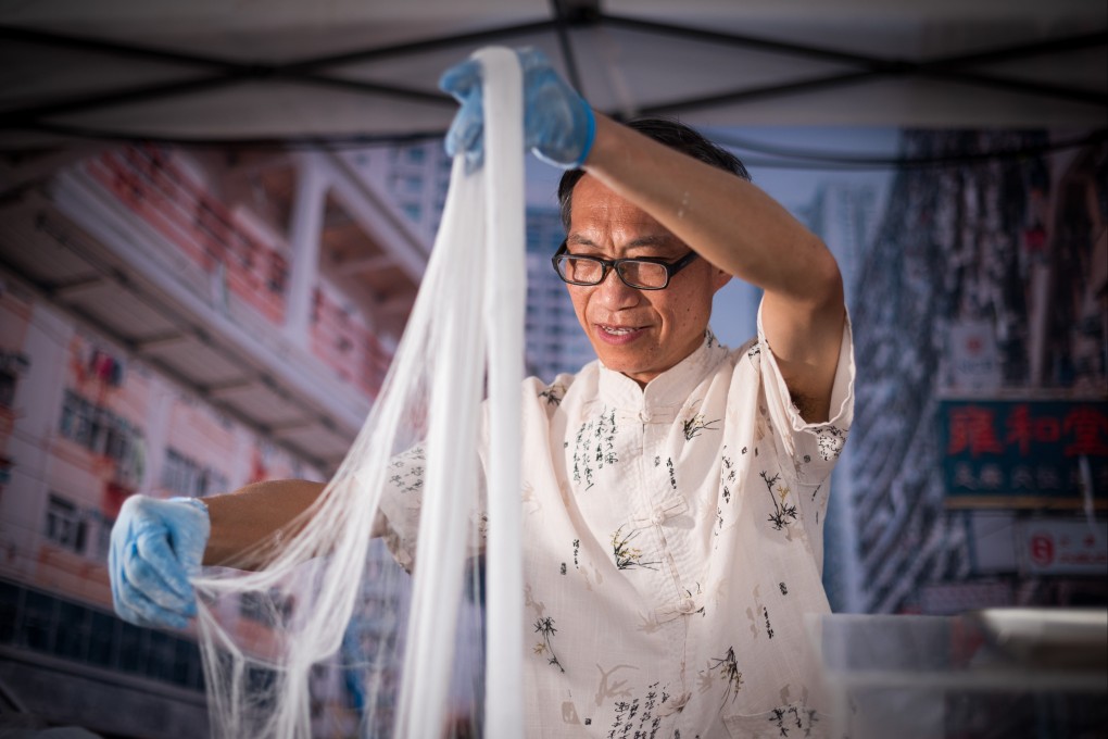 Confectioner Tam Tat-ming is one of Hong Kong’s few remaining makers of dragon’s beard candy (above) and ding ding tong. Photo: Hong Kong Culture Festival
