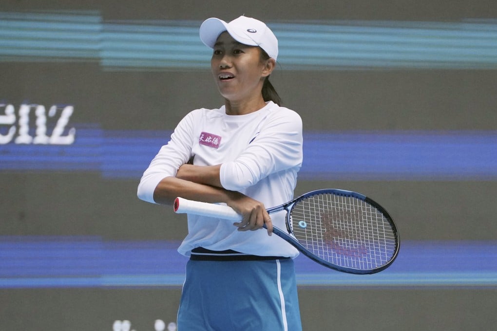 China’s Zhang Shuai reacts after defeating Poland’s Magdalena Frech to reach the quarter-finals of the China Open. Photo: AFP