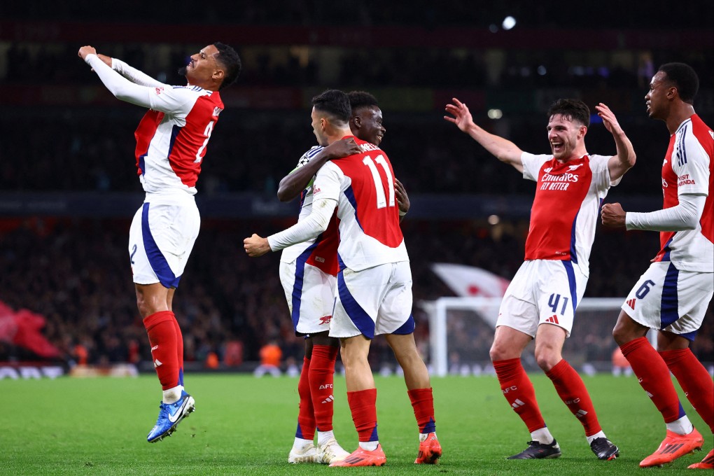Arsenal’s Bukayo Saka celebrates with his teammates as his goal helped seal a 2-0 victory over Paris Saint-Germain in the Uefa Champions League. Photo: Reuters