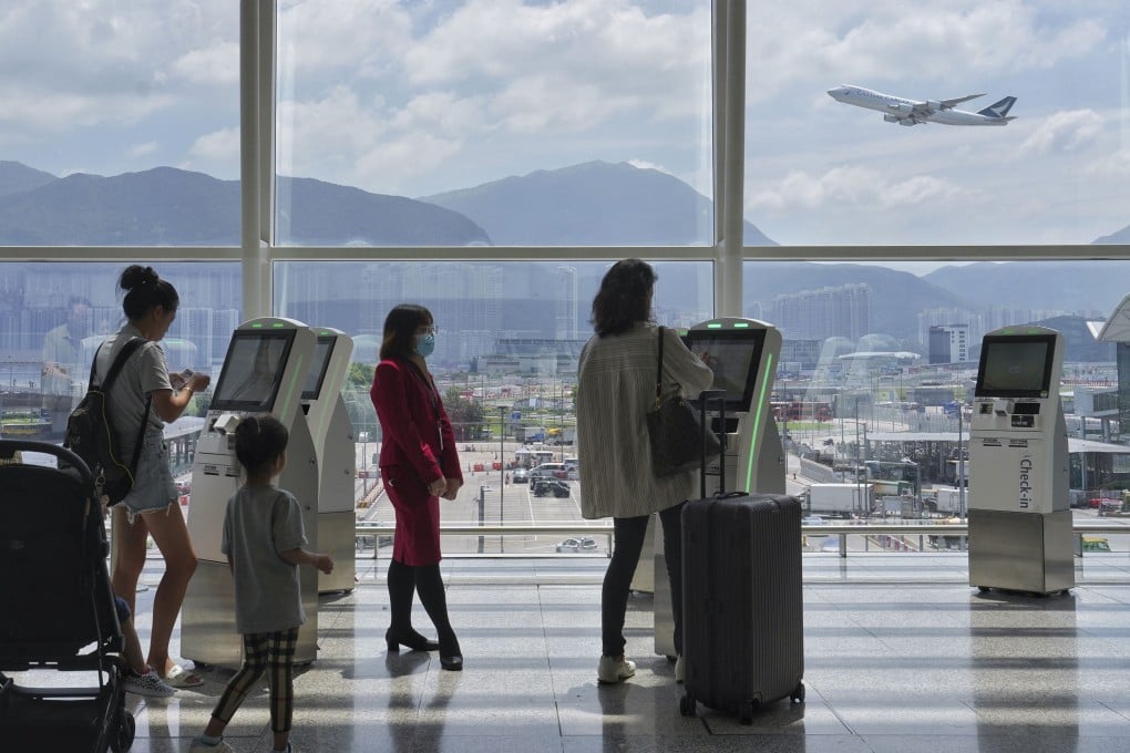 Passengers at the Cathay Pacific self check-in kiosks at Hong Kong International Airport in September. Photo: Elson Li