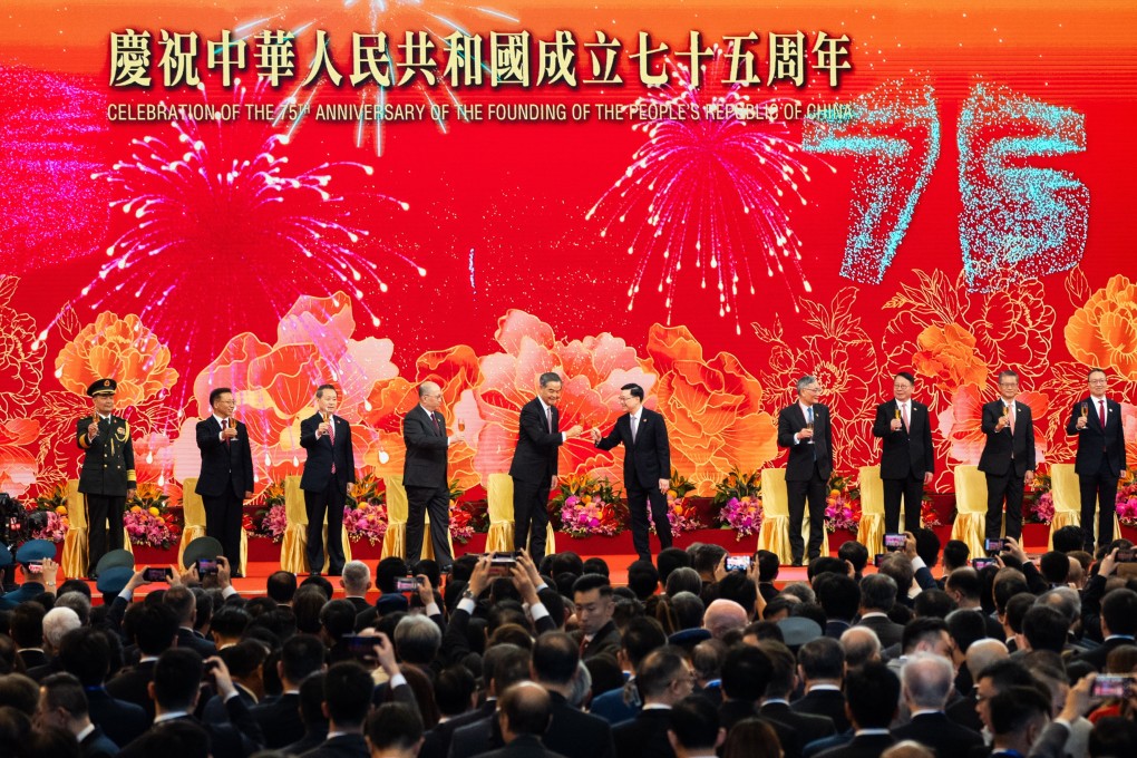 Hong Kong Chief Executive John Lee and former Chief Executive Leung Chun-ying (both centre) make a toast during a reception marking China’s National Day at the Hong Kong Convention and Exhibition Centre on October 1. Photo: EPA-EFE