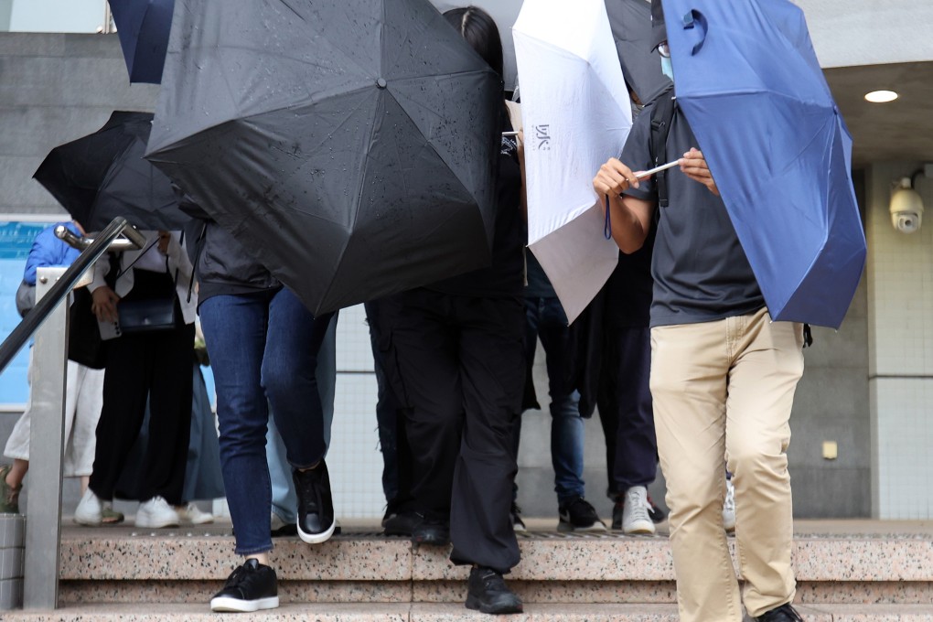 Chan Pak-yui (centre) has abandoned an appeal against his sentence. Photo: Edmond So