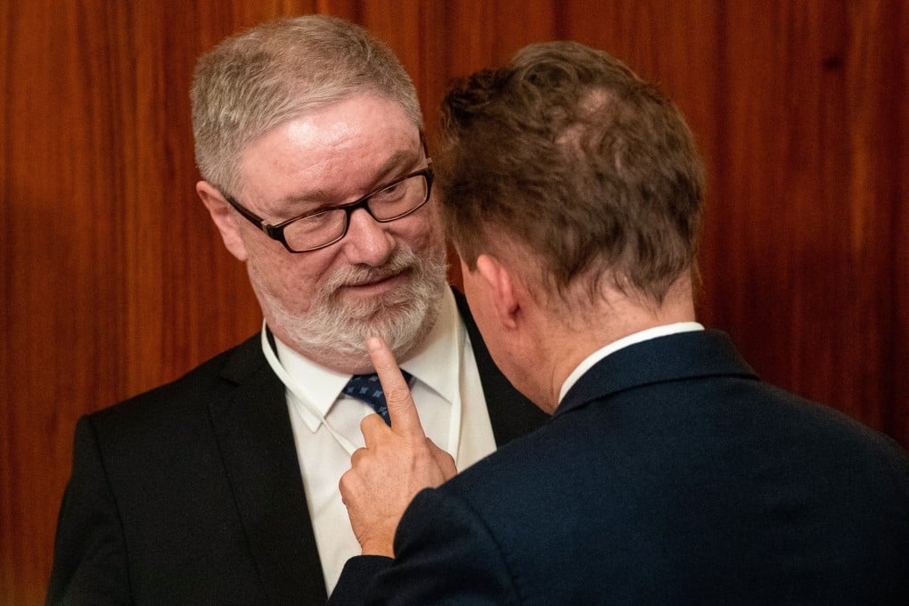 Lars-Hendrik Roller (left) speaks to a Russian official during a meeting of German and Russian delegations in 2020. Photo: AFP
