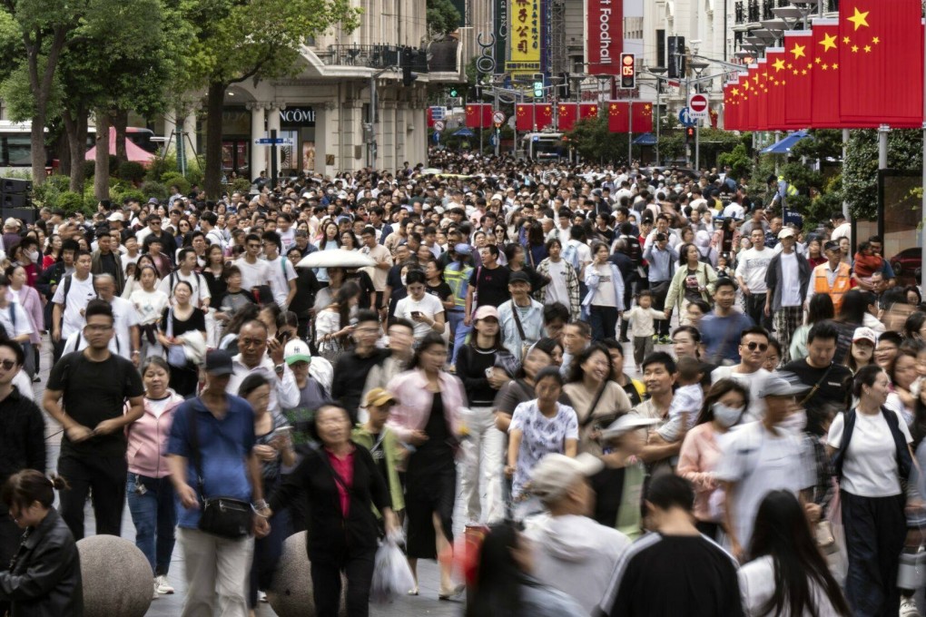 Shoppers on Nanjing East Road in Shanghai on October 2. While the stimulus measures announced by the government have lifted market sentiment, there is scepticism about whether they will translate to the real economy. Photographer: Bloomberg