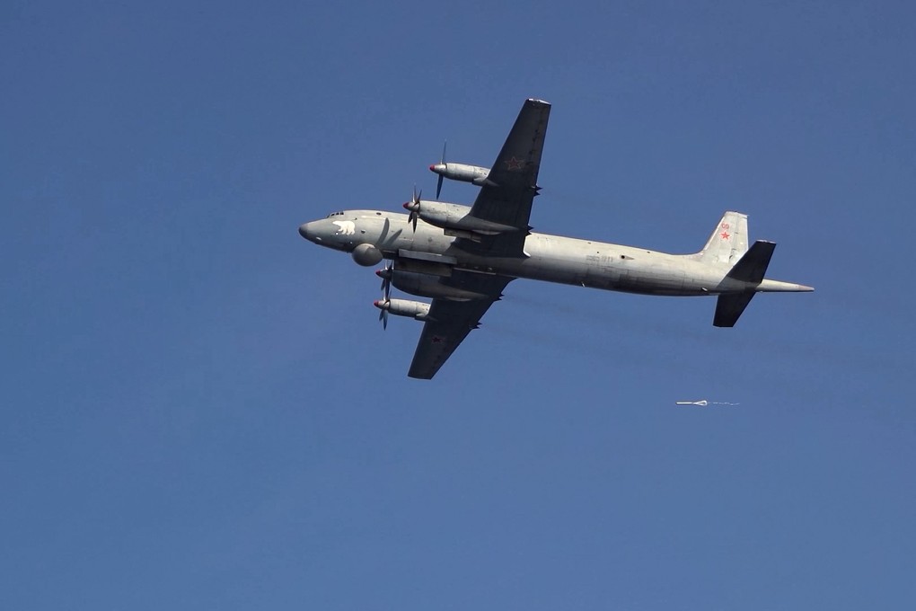 An IL-38 patrol plane of the Russian navy flies over the Barents Sea on September 11. Photo: Russian Defense Ministry Press Service/AP