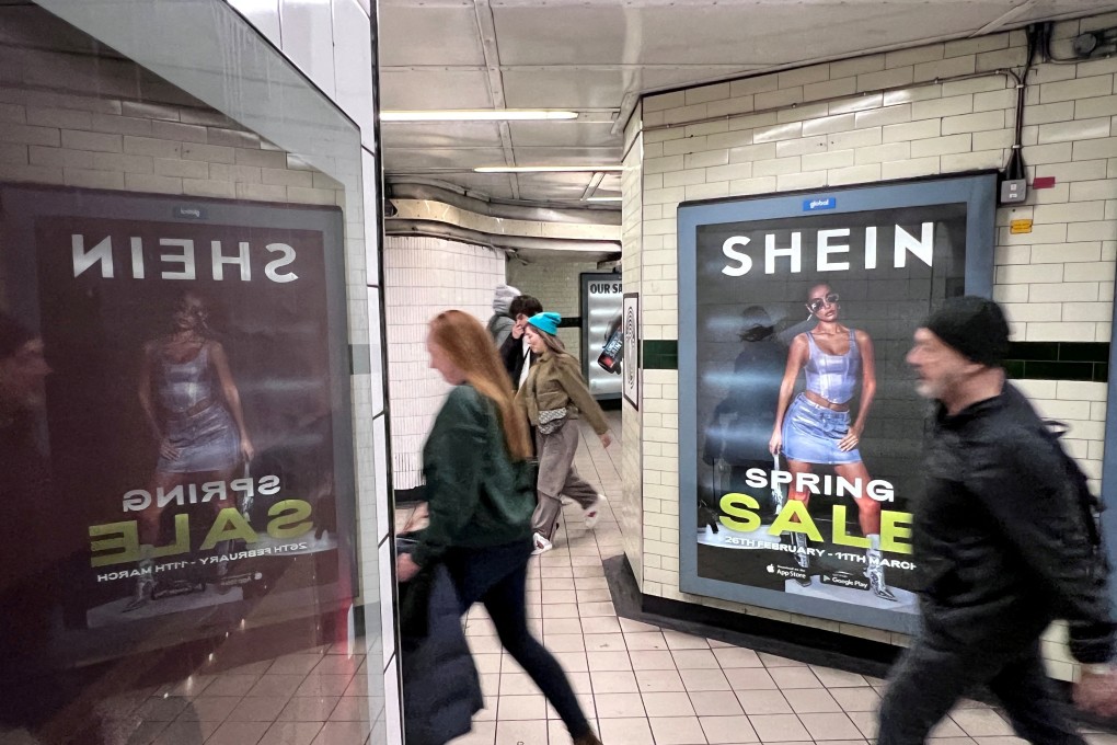 People walk past a Shein advertisement in London in April 2024. Photo: Reuters
