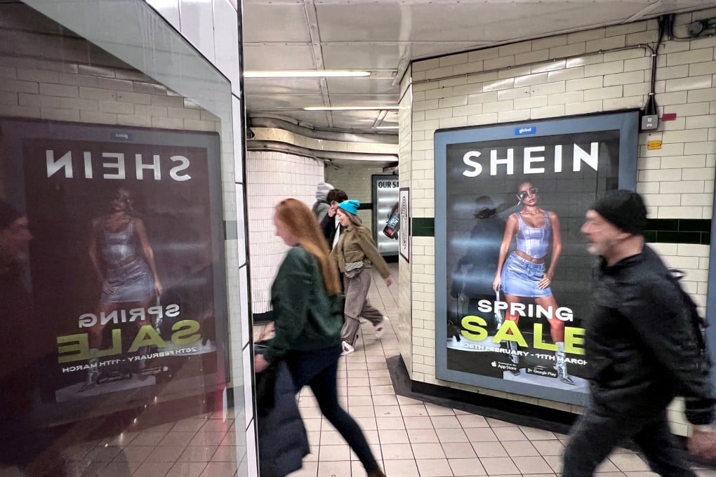 People walk past a Shein advertisement in London in April 2024. Photo: Reuters