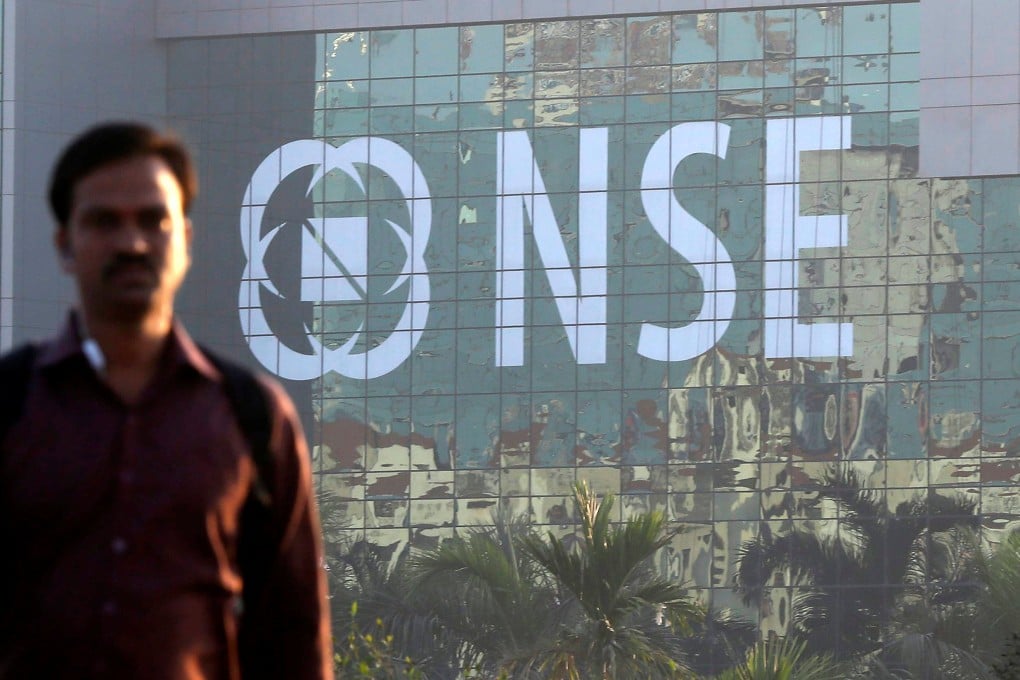 A man walks past the National Stock Exchange building in Mumbai, India. Photo: Reuters
