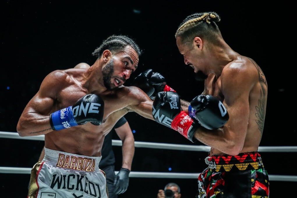 Alexis Nicolas (left) punches Regian Eersel. Photo: ONE Championship