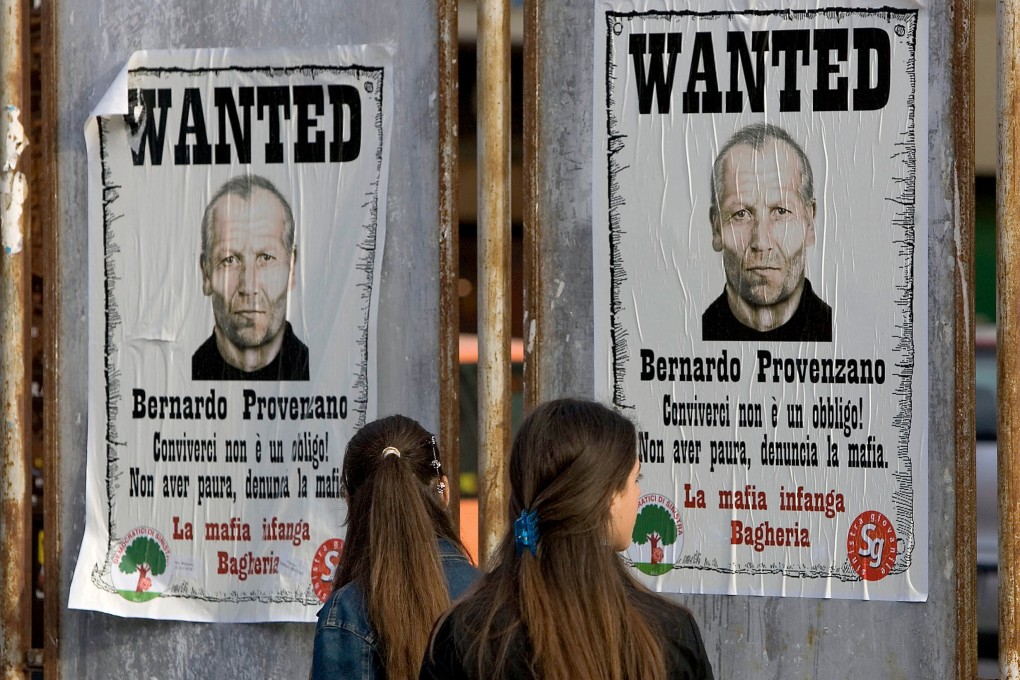 Wanted posters for the Sicilian Mafia “boss of bosses” Bernardo Provenzano in Bagheria, Sicily, in 2005. Bagheria is a beautiful coastal town with a dark legacy. Photo: AFP