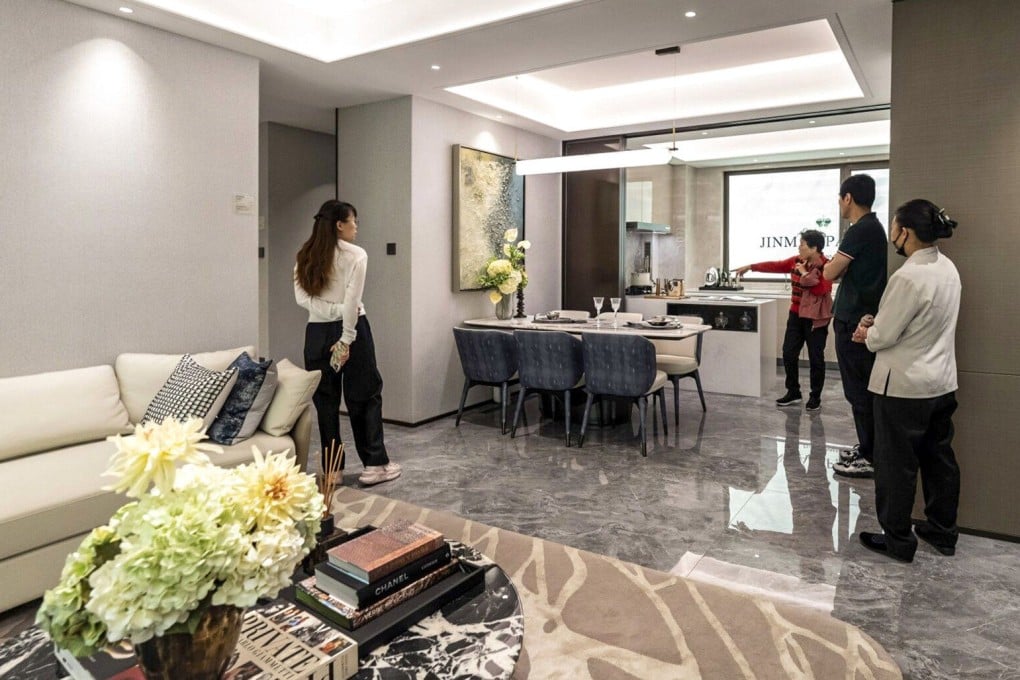 People visit a show flat for a residential project in Shanghai on Thursday. Photo: Bloomberg