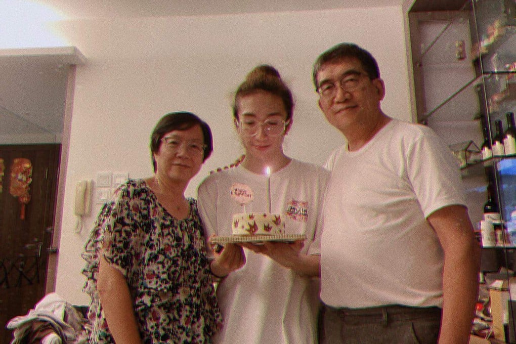Mo Li (centre) with his parents. A four-by-four-metre LED screen struck the dancer during a concert. Photo: Instagram/Mo Lee Kai-yin