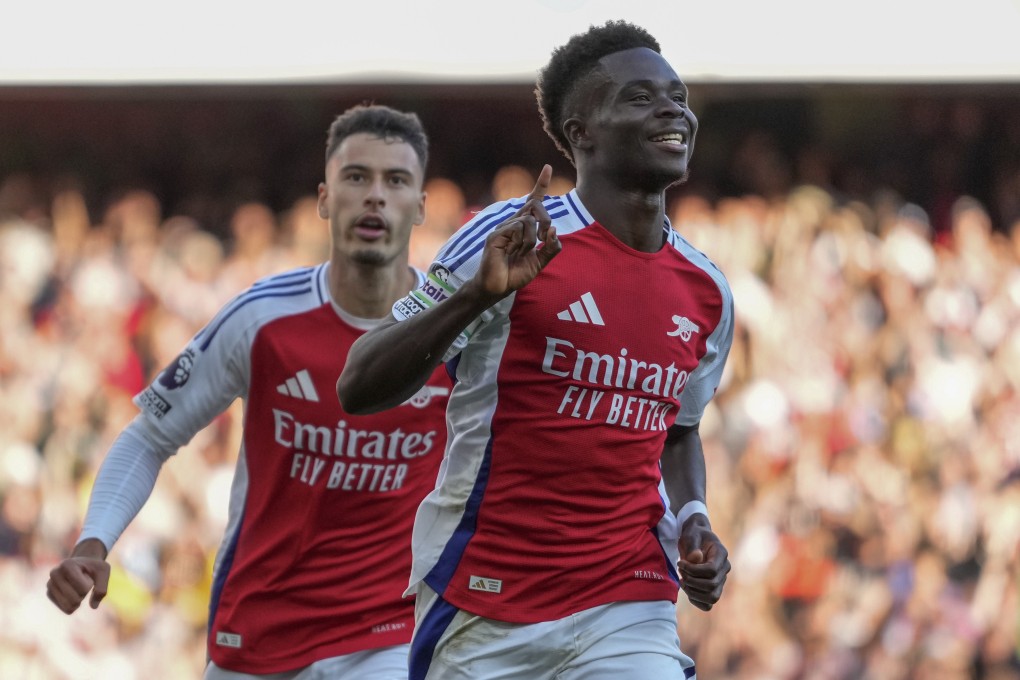 Arsenal’s Bukayo Saka celebrates after scoring the third goal against Southampton to continue their unbeaten start to the campaign. Photo: AP